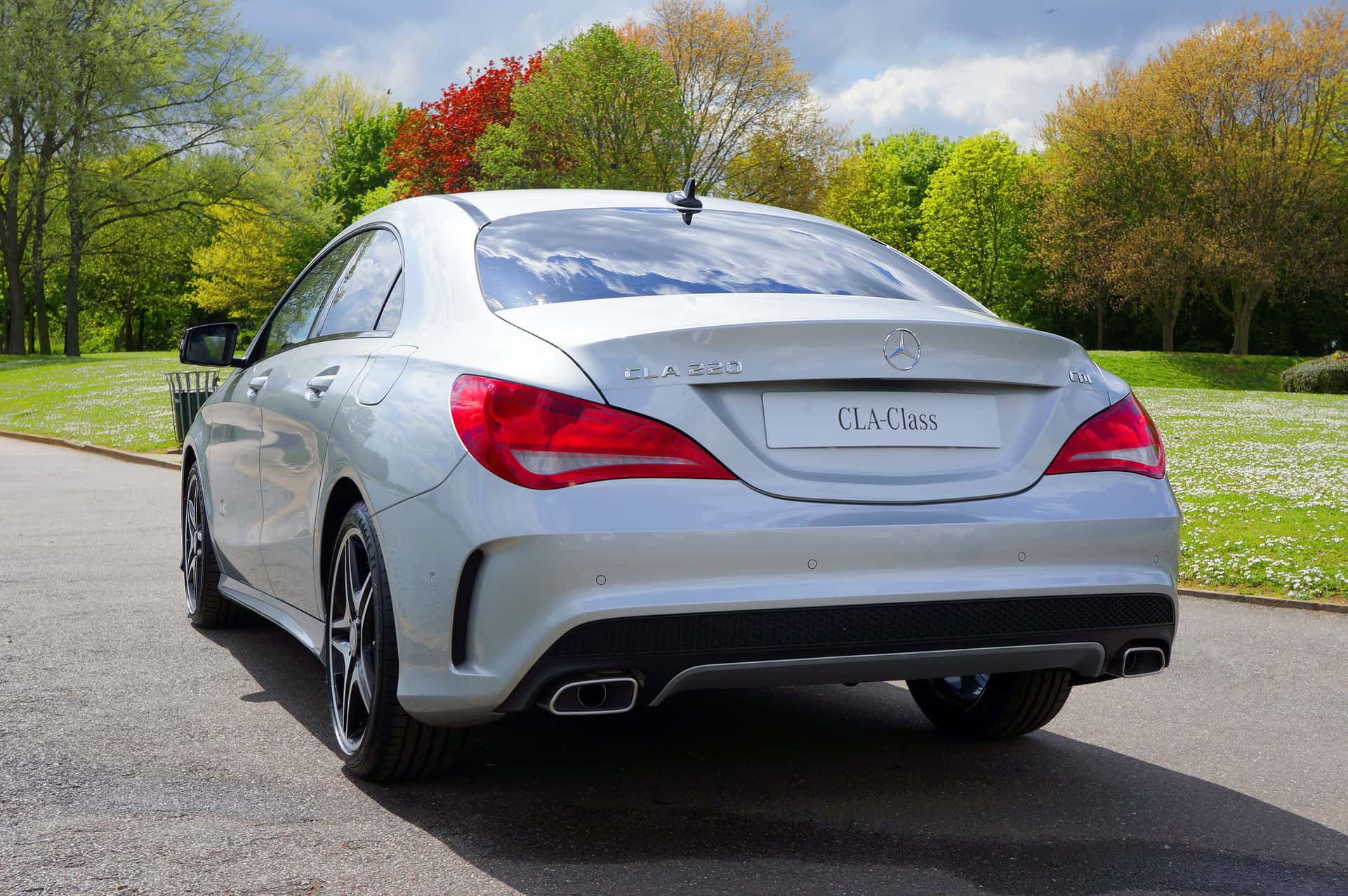 A silver Mercedes-Benz CLA-Class sedan from an earlier generation