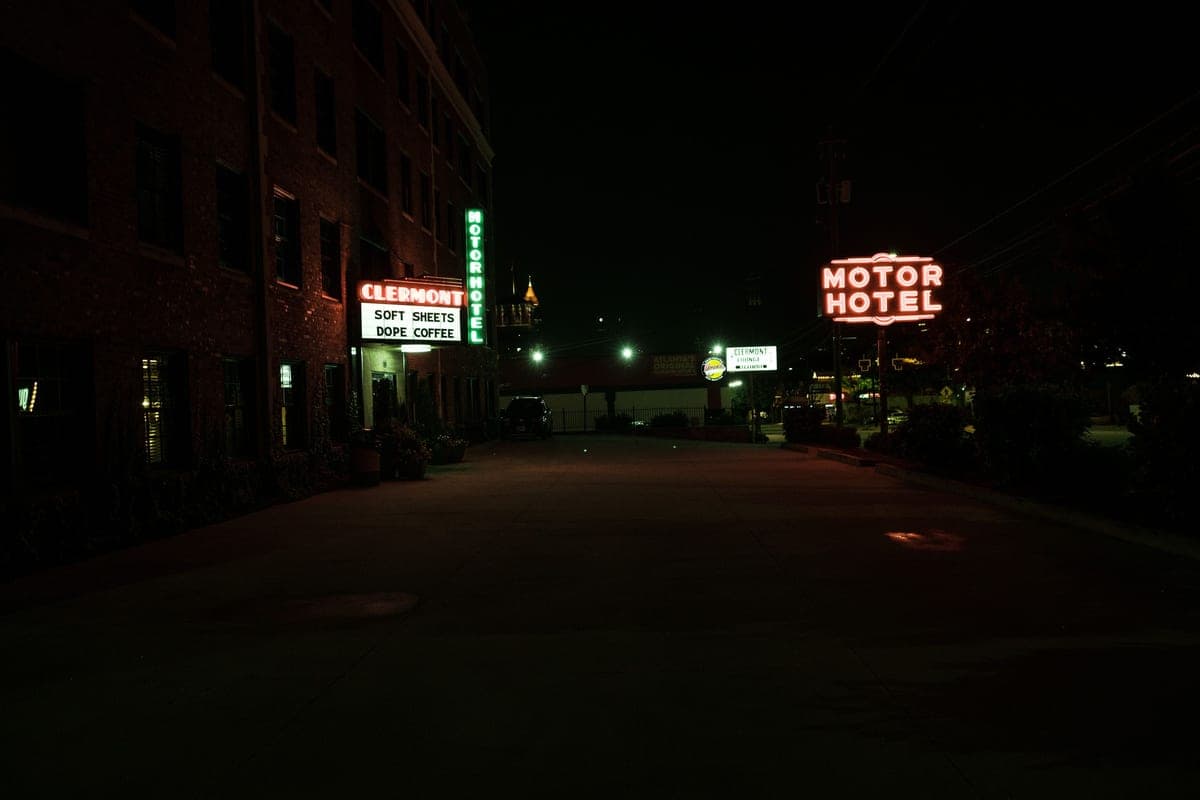Cars parked outside accommodation at night