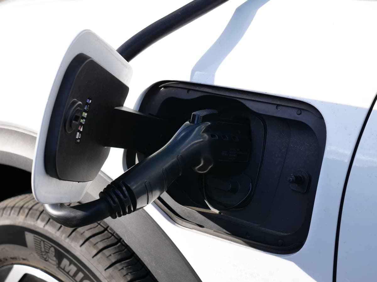 Close-up of an electric vehicle charging cable and connector