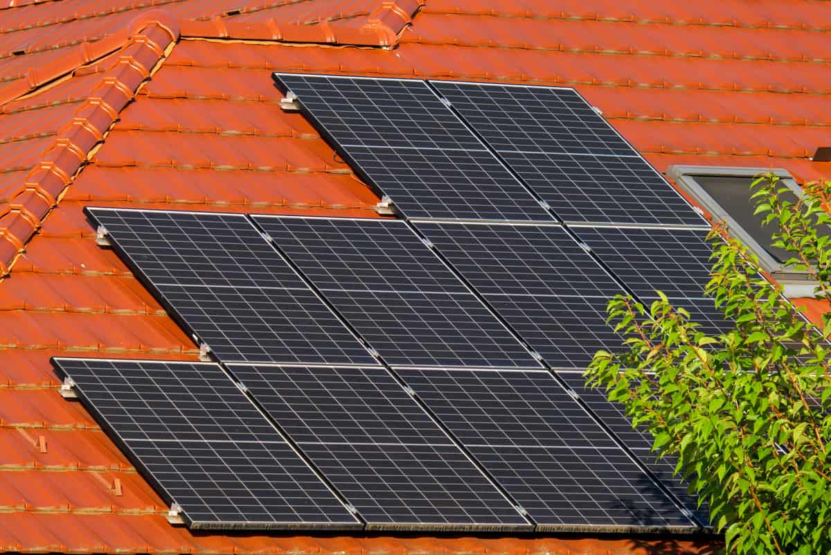 Solar panels on a house roof in daylight